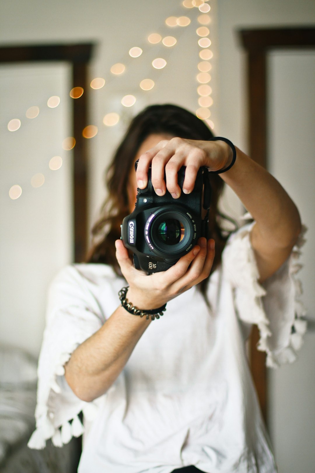 photographe face à un miroir
